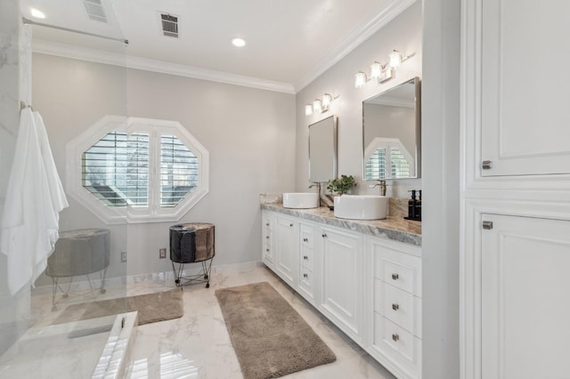 6136 E S Bear Creek Dr, Merced, CA 95340 - full bathroom featuring double vanity, marble finish flooring, ornamental molding, baseboards, and recessed lighting
