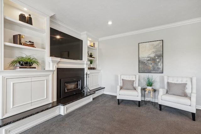 6136 E S Bear Creek Dr, Merced, CA 95340 - living area featuring baseboards, crown molding, dark colored carpet, built in shelves, and a glass covered fireplace