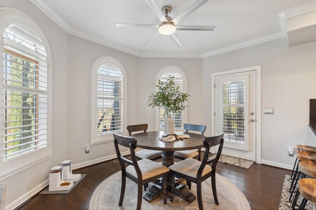 6136 E S Bear Creek Dr, Merced, CA 95340 - dining area featuring crown molding, dark wood-style floors, baseboards, and ceiling fan