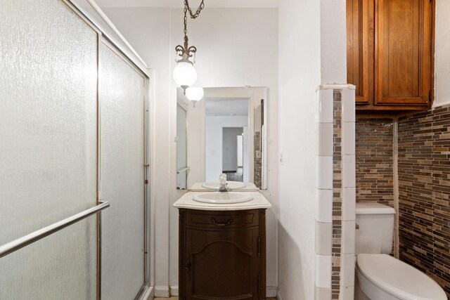 210 S Caesar Ave, Fresno, CA 93727 - full bathroom with vanity, a shower stall, and toilet