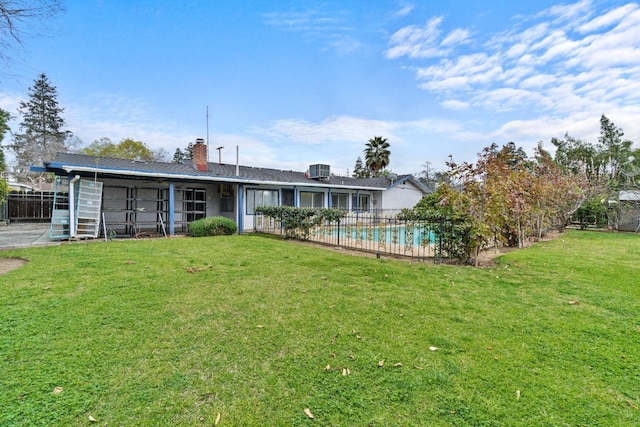 210 S Caesar Ave, Fresno, CA 93727 - rear view of house with a chimney