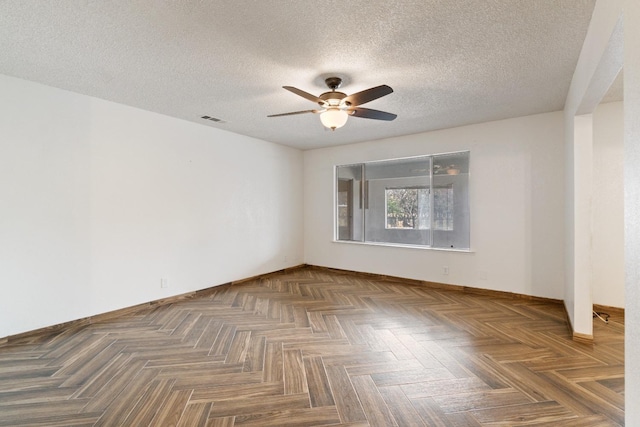 210 S Caesar Ave, Fresno, CA 93727 - empty room featuring a ceiling fan, a textured ceiling, and baseboards