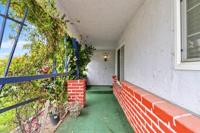 210 S Caesar Ave, Fresno, CA 93727 - doorway to property with stucco siding