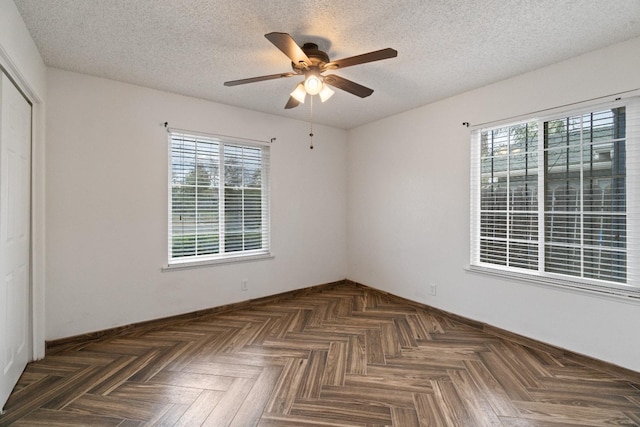 210 S Caesar Ave, Fresno, CA 93727 - unfurnished room featuring healthy amount of natural light, a ceiling fan, a textured ceiling, and baseboards