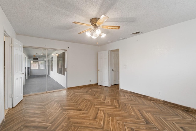 210 S Caesar Ave, Fresno, CA 93727 - empty room featuring ceiling fan, a textured ceiling, and baseboards