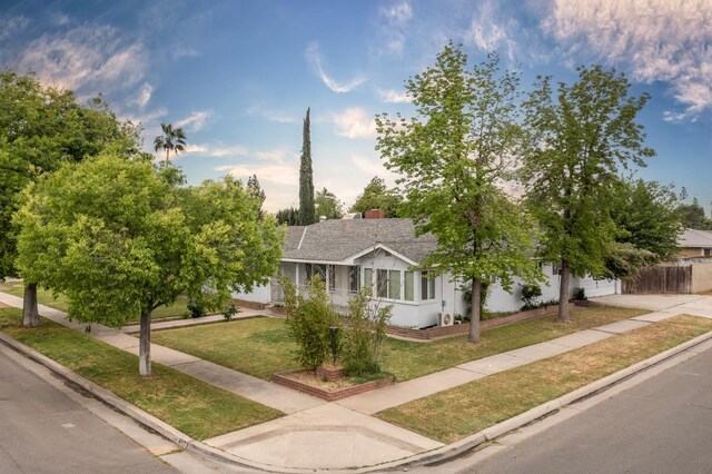 467 E San Bruno Ave, Fresno, CA 93710 - view of front of property with roof with shingles and concrete driveway