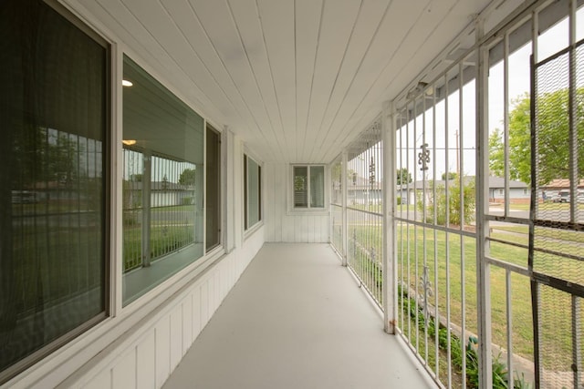 467 E San Bruno Ave, Fresno, CA 93710 - unfurnished sunroom with healthy amount of natural light and finished concrete flooring