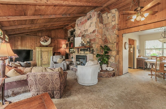 living area featuring carpet flooring, wood walls, wood ceiling, and lofted ceiling with beams