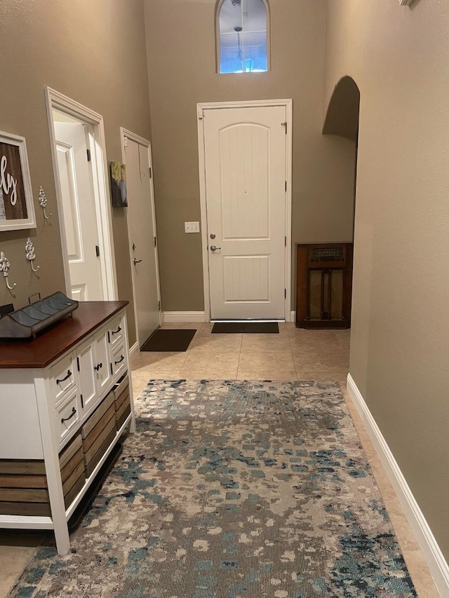289 S Timberline Dr, Madera, CA 93637 - tiled entryway featuring a high ceiling and arched walkways