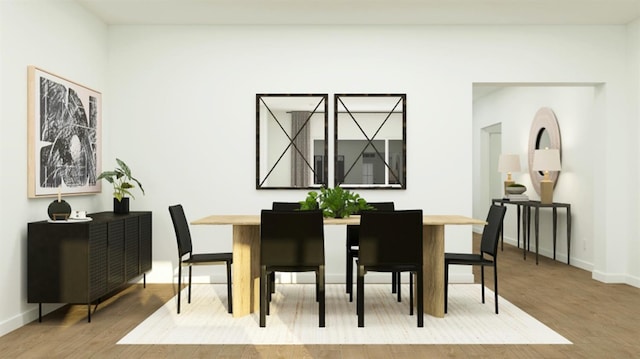 1260 Bloom Ave Unit 34, Clovis, CA 93619 - dining space featuring wood finished floors and baseboards