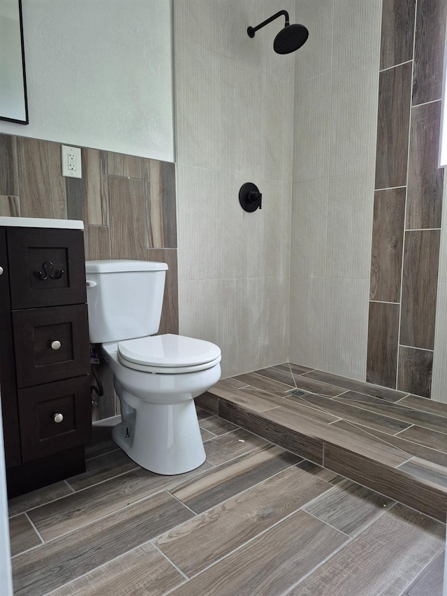 27261 Stanford Ave, Madera, CA 93637 - full bathroom featuring a tile shower and tile walls