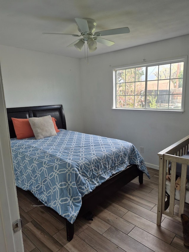 27261 Stanford Ave, Madera, CA 93637 - bedroom with wood finished floors and a ceiling fan