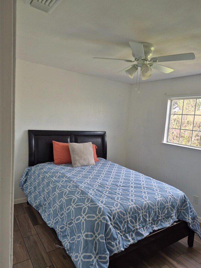 27261 Stanford Ave, Madera, CA 93637 - bedroom featuring wood finished floors and ceiling fan