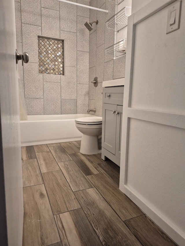 27261 Stanford Ave, Madera, CA 93637 - bathroom with shower / bath combination, vanity, and wood finished floors