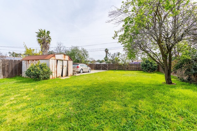 1417 Humboldt Ave, Chowchilla, CA 93610 - fenced backyard featuring a storage unit