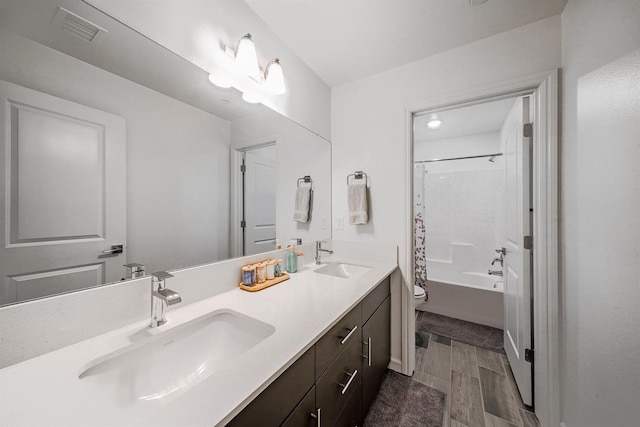1935 Minarets Ln, Clovis, CA 93611 - bathroom featuring a sink, visible vents, toilet, and double vanity