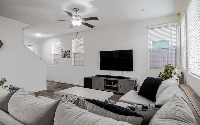1935 Minarets Ln, Clovis, CA 93611 - living room featuring baseboards, wood finished floors, a healthy amount of sunlight, and ceiling fan