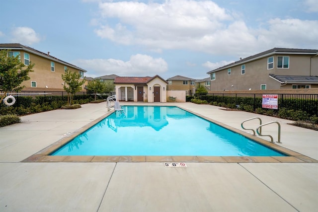 1935 Minarets Ln, Clovis, CA 93611 - pool featuring a residential view, a patio, and fence