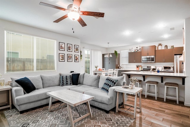 1935 Minarets Ln, Clovis, CA 93611 - living room with a ceiling fan, visible vents, light wood finished floors, a toaster, and recessed lighting