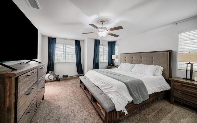 1935 Minarets Ln, Clovis, CA 93611 - bedroom with visible vents, carpet floors, and a ceiling fan