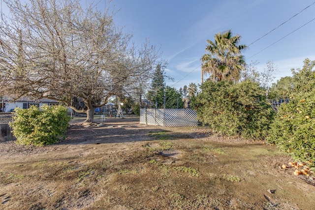 view of yard featuring fence