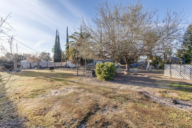 view of yard with fence