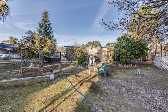 view of yard with fence