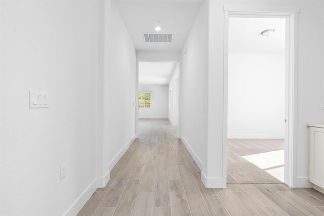 8163 Creek Vw, Friant, CA 93626 - hallway with light wood-style flooring and recessed lighting