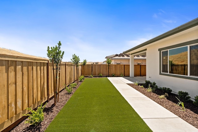 8163 Creek Vw, Friant, CA 93626 - fenced backyard with a patio