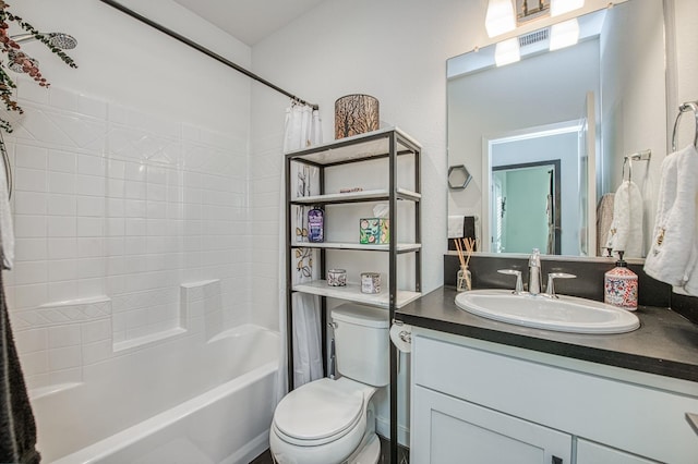 full bathroom with toilet, vanity, and shower / bath combo with shower curtain