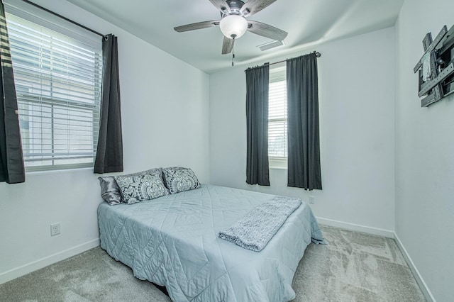 bedroom featuring visible vents, baseboards, and carpet floors