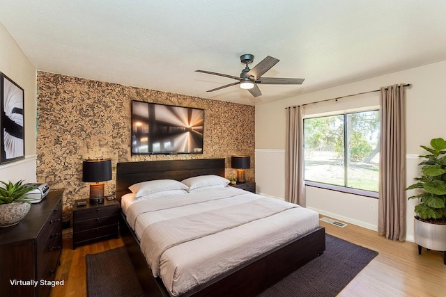 41371 Butte Way, Madera, CA 93636 - bedroom featuring wood finished floors and a ceiling fan