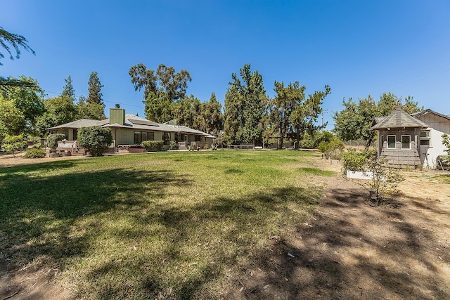 41371 Butte Way, Madera, CA 93636 - view of grassy yard featuring an outdoor structure