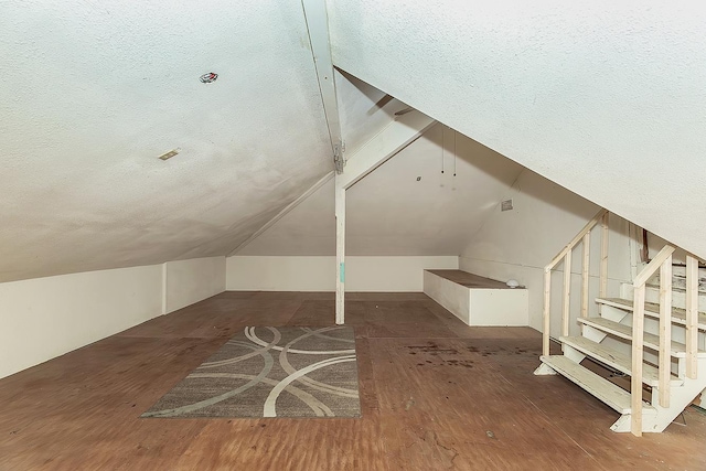 41371 Butte Way, Madera, CA 93636 - bonus room featuring hardwood / wood-style floors, a textured ceiling, and lofted ceiling