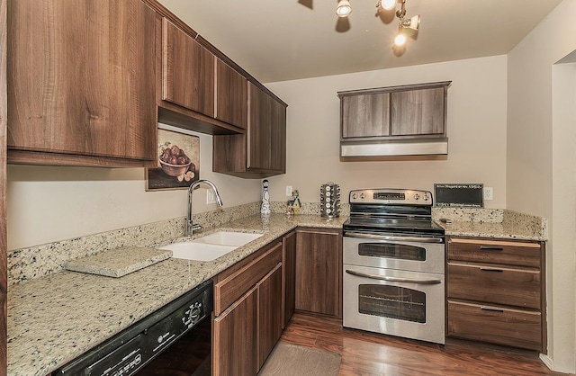 41371 Butte Way, Madera, CA 93636 - kitchen with double oven range, black dishwasher, dark wood-type flooring, light stone countertops, and dark brown cabinets