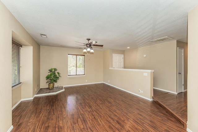 41371 Butte Way, Madera, CA 93636 - spare room featuring wood finished floors, a ceiling fan, and a textured ceiling