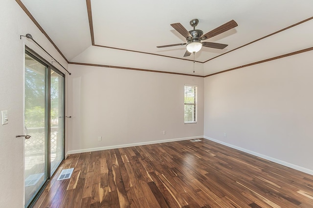 41371 Butte Way, Madera, CA 93636 - spare room with plenty of natural light, dark wood-style flooring, ceiling fan, ornamental molding, and vaulted ceiling