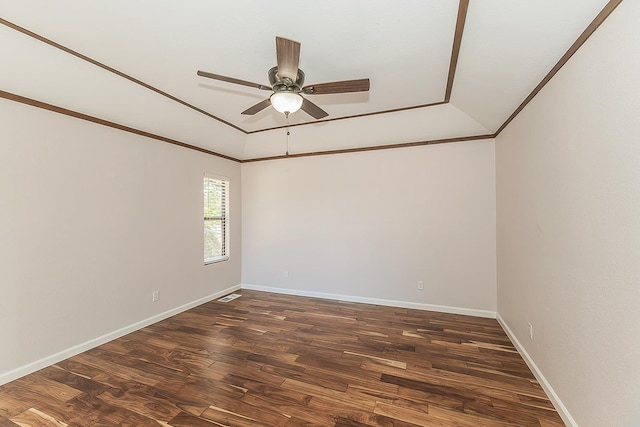 41371 Butte Way, Madera, CA 93636 - spare room with a ceiling fan, dark wood-style flooring, and a tray ceiling