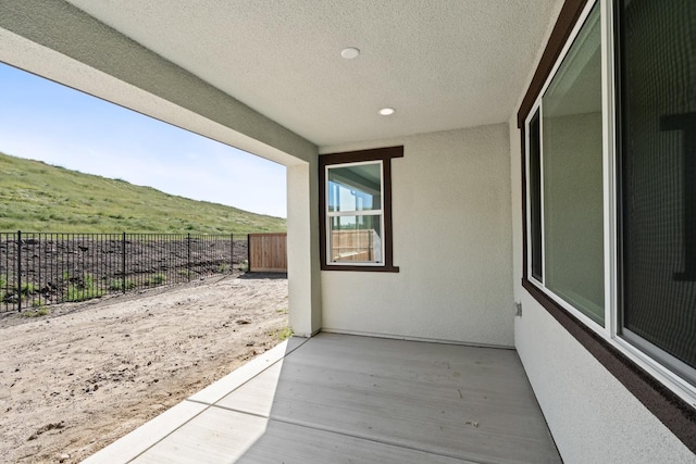 exterior space featuring a patio and fence