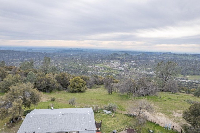aerial view featuring a rural view and a mountain view