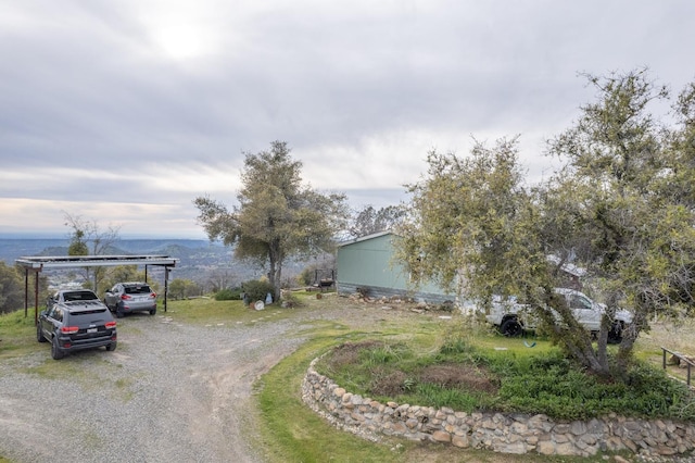 view of road with driveway