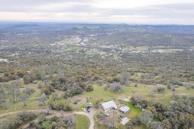 drone / aerial view featuring a mountain view