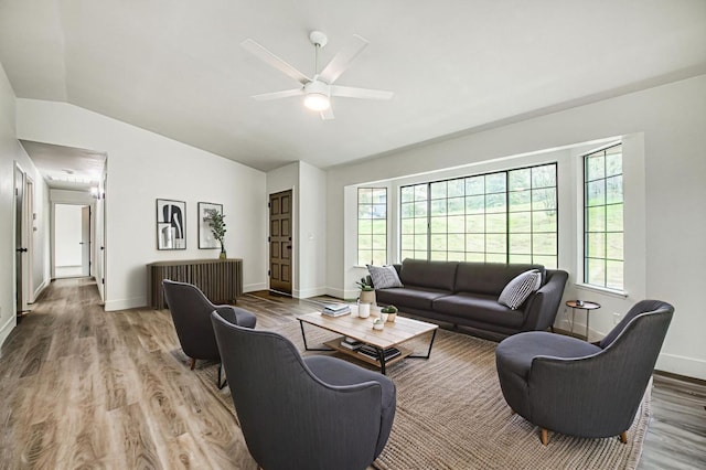 42741 Revis Way, Coarsegold, CA 93614 - living area featuring vaulted ceiling, a ceiling fan, and wood finished floors
