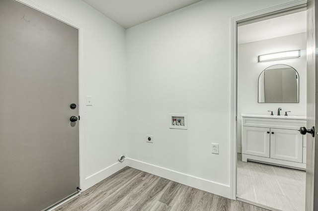 42741 Revis Way, Coarsegold, CA 93614 - washroom featuring electric dryer hookup, washer hookup, and light wood-style floors
