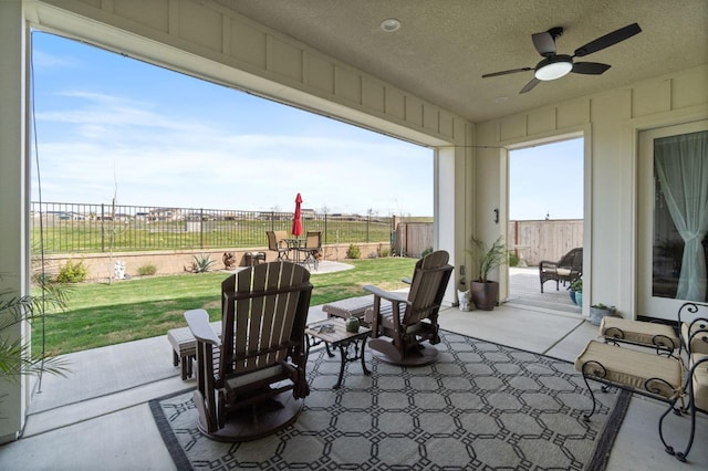 958 Beaver Pond, Madera, CA 93636 - fenced backyard featuring a ceiling fan and a patio area
