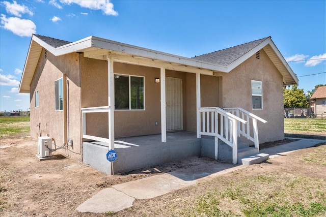 430 S Thorne Ave, Fresno, CA 93706 - view of front of house with stucco siding and a shingled roof