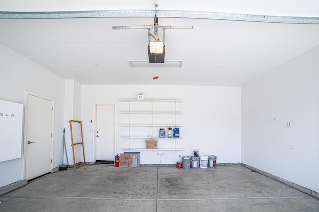 3418 El Molino, Clovis, CA 93619 - garage featuring a garage door opener