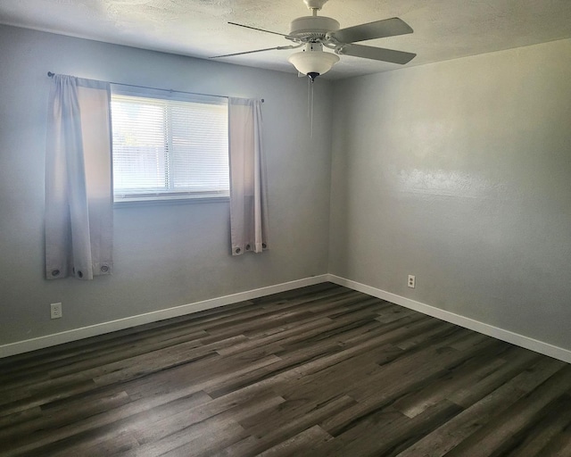 4336 E Austin Way, Fresno, CA 93726 - unfurnished room with dark wood finished floors, a ceiling fan, and baseboards