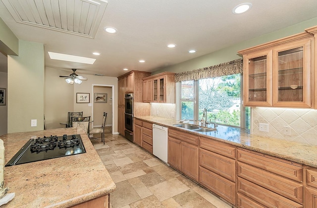 411 W Vartikian Ave W, Fresno, CA 93704 - kitchen with black stovetop, white dishwasher, tasteful backsplash, stainless steel double oven, and recessed lighting