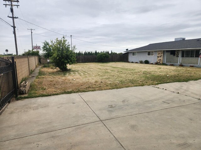 view of yard featuring fence